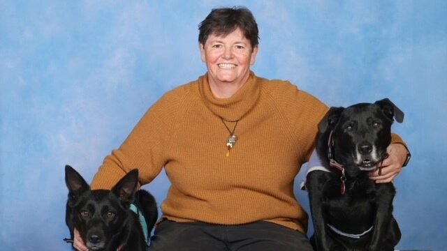 Linda with her two dogs.